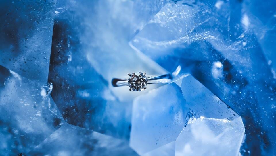 Diamonds with a soft blue fluorescent glow