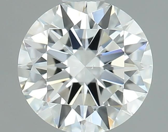 0.71 carat round cut diamond, G color, VS1 clarity — face-up view