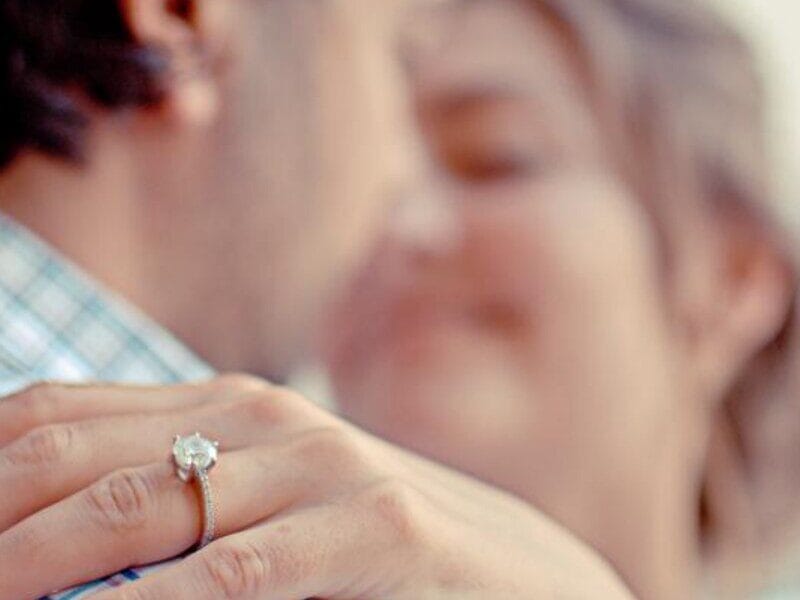 A couple embracing with an engagement ring — how to propose in Lebanon