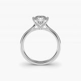 Round Solitaire Engagement Ring with Intricate Basket, profile view