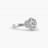 Bague de fiançailles vintage halo glamour sur diamant rond, vue de côté