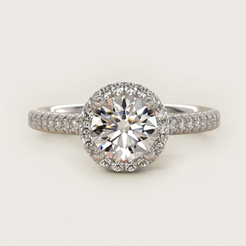 Round diamond halo engagement ring in white gold
