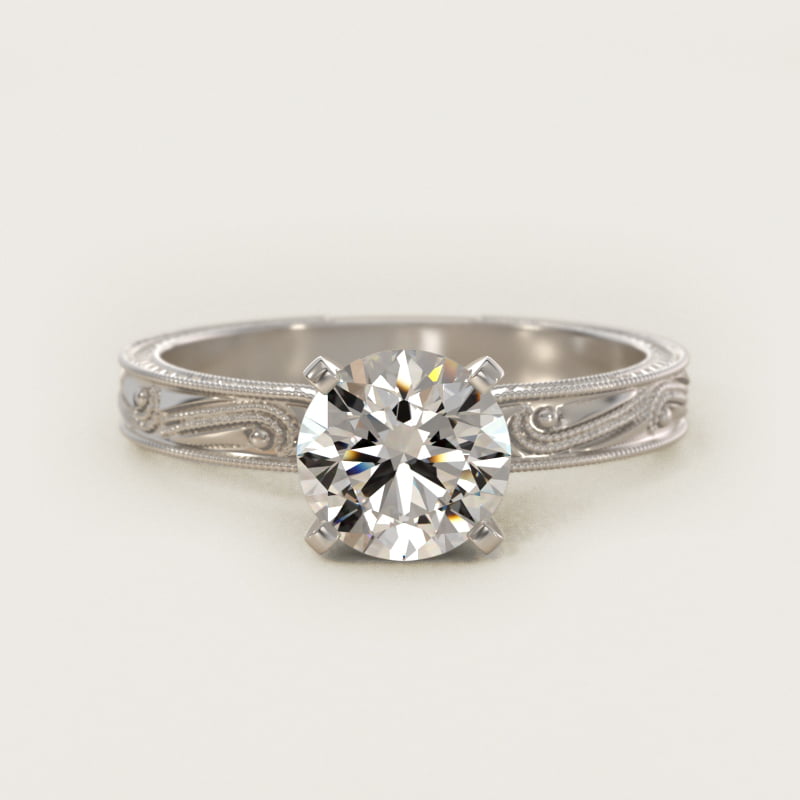 Half-carat round diamond solitaire engagement ring in white gold