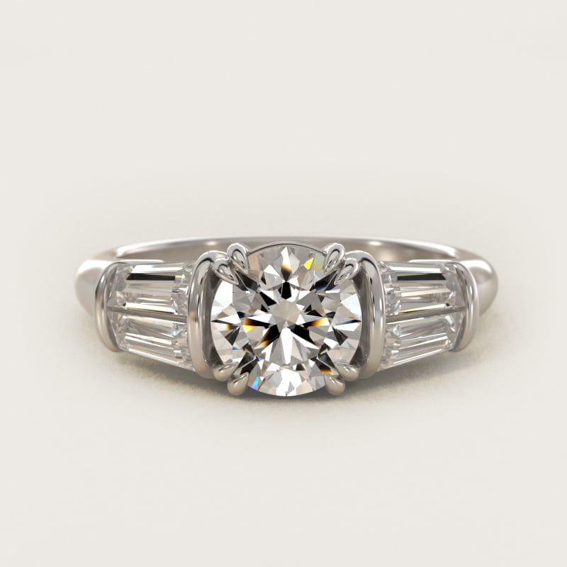 Round side-stone diamond engagement ring with tapered baguettes in white gold
