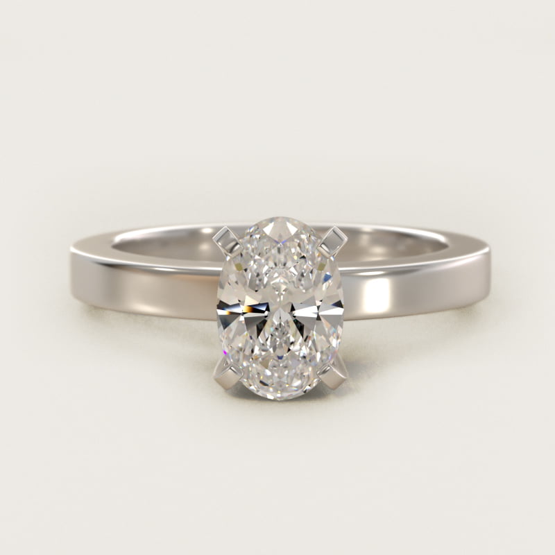 Oval cut solitaire diamond engagement ring in white gold