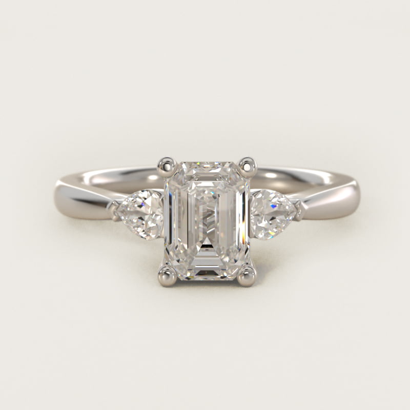 Bague de fiançailles taille émeraude à pierres latérales poire