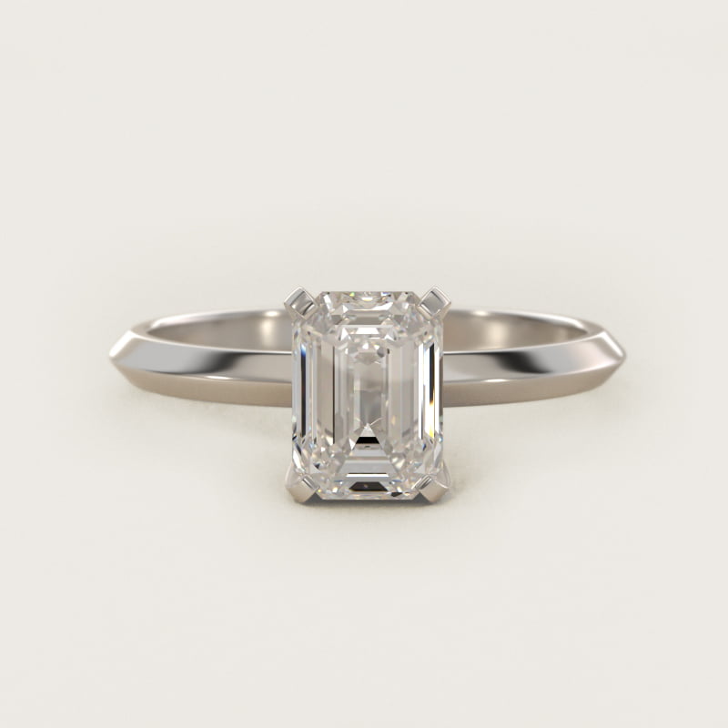 Emerald-cut diamond solitaire engagement ring in white gold