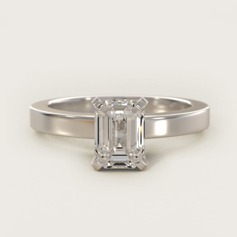 Bague de fiançailles solitaire avec diamant taille émeraude en or blanc