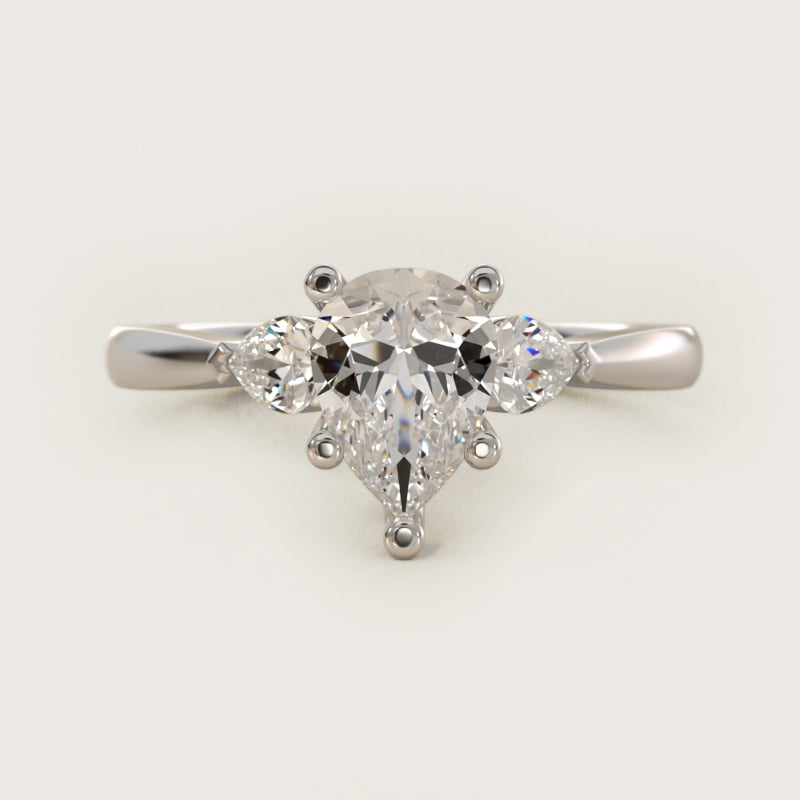 Bague de fiançailles diamant taille poire à pierres latérales