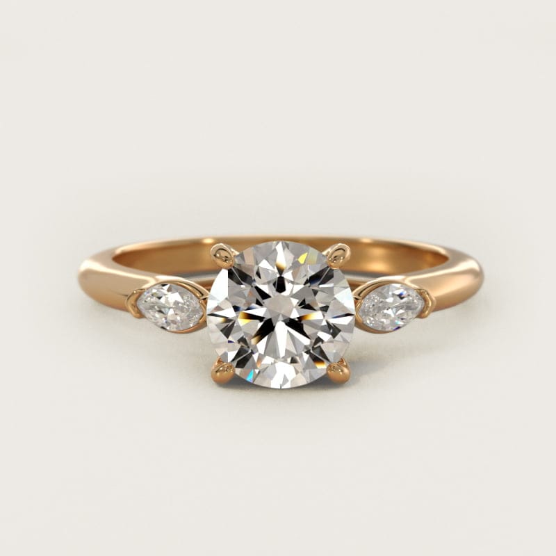 Round Three-Stone Diamond Engagement Ring with Marquise Accents in white gold — handcrafted in Beirut