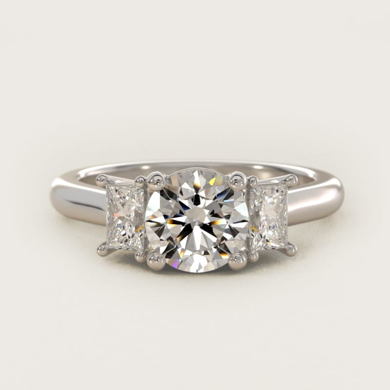 Round Three-Stone Diamond Engagement Ring with Princess Accents in white gold — handcrafted in Beirut